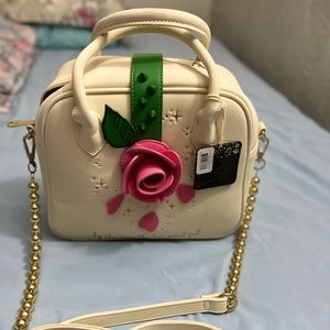 Cartera de beauty and the beast.